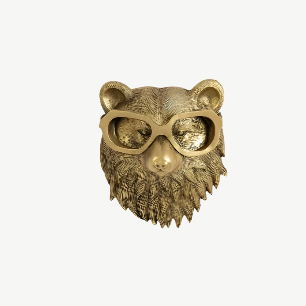 Dekoratívny zlatý nástenný háčik - diskrétna elegancia a lesklý povrch